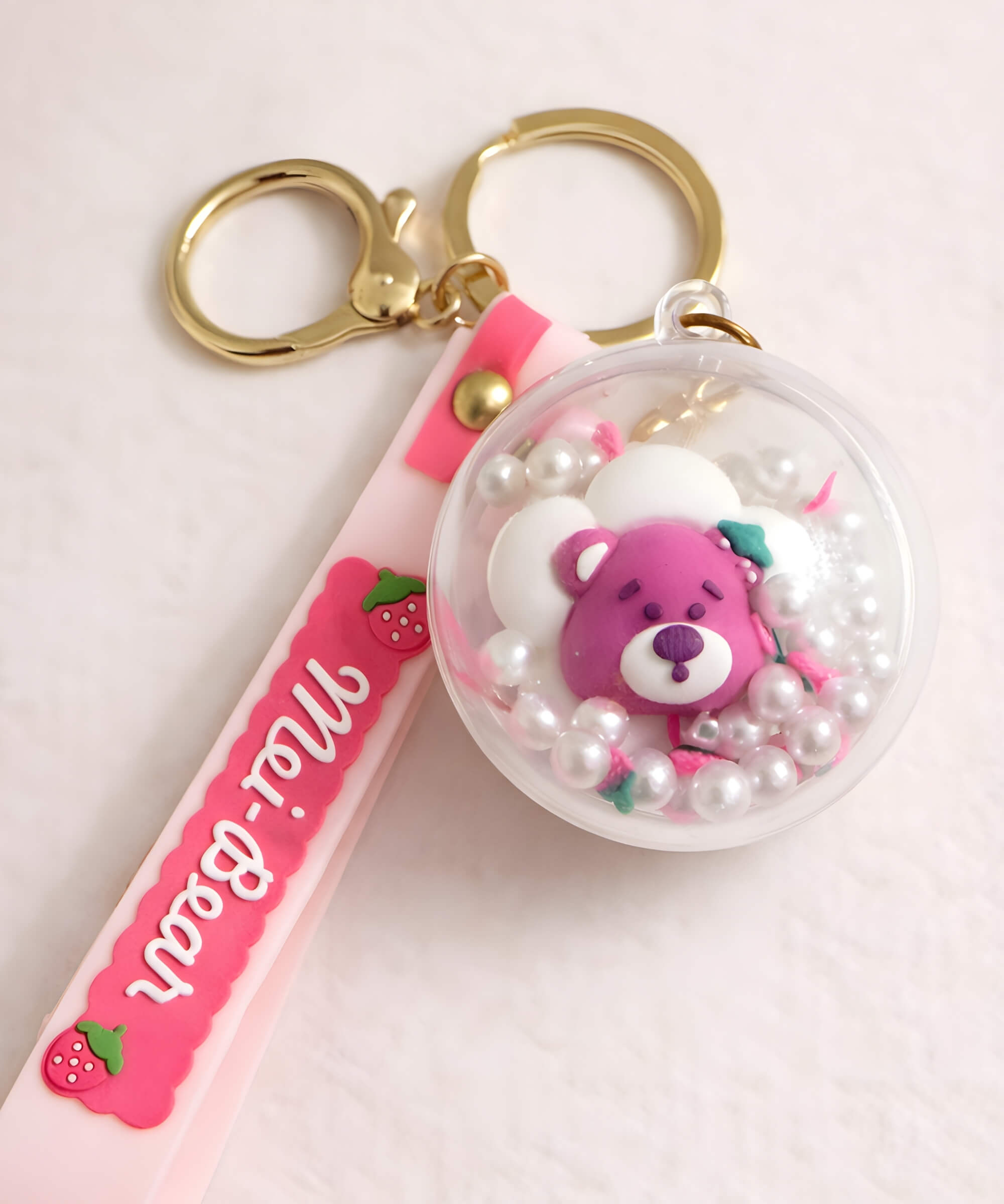 Strawberry bear flower face shaker keychain with floating beads inside round charm
